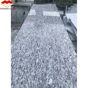 China supplier high quality Guangxi sea wave granite spray white granite