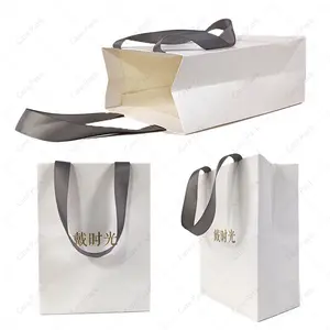 Sıcak satış özel baskı alışveriş hediye keseleri kendi Logo giyim hediye mat yenilebilir kağıt bagbagile şerit