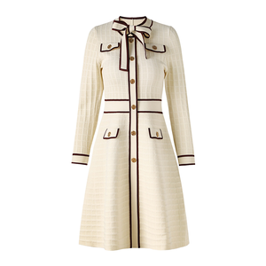 Robe trapèze élégante et décontractée en tricot uni avec nœud pour <span class=keywords><strong>femme</strong></span>, col rond, manches longues, simple boutonnage, courte, en viscose et fibres naturelles - Product Image 1