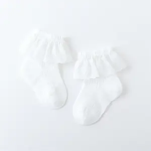 Nouveau-né bébé filles chaussettes Tube respirant anti-bactérien Logo Design décontracté printemps tricoté en gros coloré mince anti-dérapant dentelle