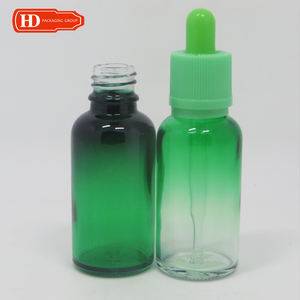 Botella de vidrio de color naranja brillante para masaje corporal con logotipo personalizado con tapón de rosca cuentagotas naranja - Product Image 2