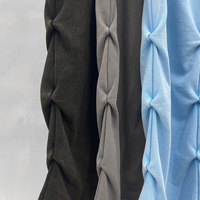 Pantalon de jogging ample pour femme en mélange de coton épais 400 g/m², délavé à l'acide, effet vieilli, déstructuré, plissé, coupe large, style streetwear