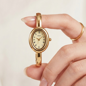 Vintage Oval Gold <b>Bangle</b> Watch for Women with Roman Numerals Diamond Set Dial Integrated Quartz Watch - Product Image 4