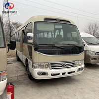Vente en gros de minibus Coaster d'occasion 2024, durable, moteur diesel, conduite à gauche