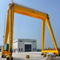 Grue à portique mobile robuste pour les opérations de conteneurs avec une capacité de levage de 20 à 40 tonnes, entraînement par moteur et moteur