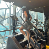 Appareil de marche sur les escaliers compact avec marches rotatives, moniteur numérique et bouton de résistance pour l'exercice de grimpeuse en intérieur