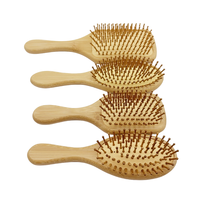 Brosse à cheveux en bois à poils de bambou pour démêler les cheveux bouclés, masser le cuir chevelu et démêler les boucles
