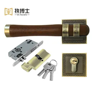 Combina la maniglia della porta in lega di zinco e palissandro per il Set di serrature per porte rotonde di lusso dorato di alta qualità