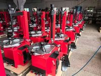 Machine à changer les pneus automatique à commande directe d'usine avec briseur de talon pneumatique et plateau tournant pour centre de service des pneus