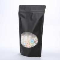Sac de pochette Ziplock Doypack noir avec fenêtre ovale debout en plastique PE et PET pour l'emballage et le stockage des aliments