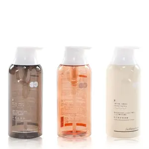 Plastik şişeler 300ml 400ml 500ml şeffaf PET stok kozmetik ambalaj şampuan şişesi ile benzersiz tasarım lüks pompa