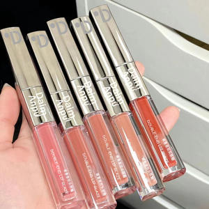 Daimanpu increíble a granel al por mayor Etiqueta Privada brillo de labios brillante secado rápido Natural impermeable protector solar brillo de labios - Product Image 1