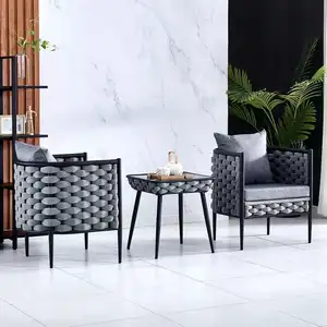 Set di sedie da tavolo in Rattan da esterno in stile cinese nuovo creativo Set da giardino cortile pomeriggio tè tre pezzi per il tempo libero divano