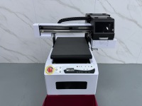Imprimante UV à plat numérique pour vêtements, imprimante UV A4, machine d'impression I3200 XP600 pour motifs de maillots, emblèmes en TPU