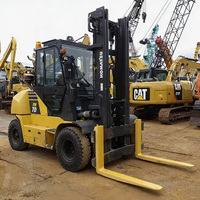 Chariot élévateur diesel Komatsu 7T d'occasion d'origine japonaise à prix bas avec mât à deux étages et pneus pneumatiques - Prix bas