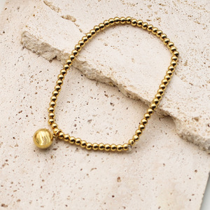 European American Style 18K Gold Elastic Bead Bracelet Titanium Steel Round Ball Geometric Design Jewelry - Product Image 1