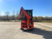 Chargeuse-pelleteuse professionnelle 4x4 robuste avec godet de chargement frontal et bras d'excavation arrière