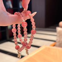 Bracelet classique en perles de quartz fraise naturel avec nœud en cristal, idéal pour un cadeau unisexe