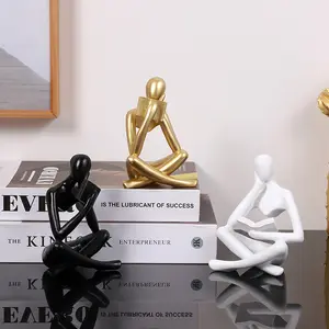 北欧のホームオフィスのテーブルの装飾品本を読む抽象的な人々置物シンカー像樹脂彫刻