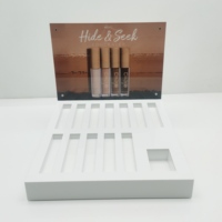 Présentoir de maquillage en acrylique Présentoir de coussin d'air compact Rouge à lèvres Crayon à sourcils Table de placement des produits