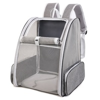 Sac de transport pour animaux de compagnie avec poches latérales pour un rangement supplémentaire, spacieux, respirant et confortable, pour chiens et chats.