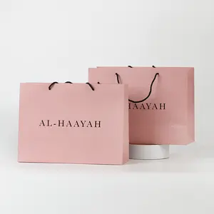 Logotipo personalizado luxuoso impresso papel do presente saco de compras charmoso com seu próprio logotipo