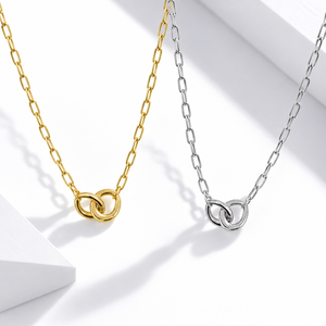Collier pendentif minimaliste en acier inoxydable avec anneaux entrelacés plaqué or et chaîne à maillons argentés, unisexe, pour tous les jours - Product Image 1