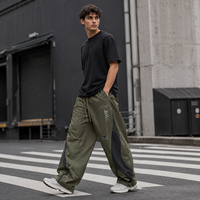 Private Label Herren Fallschirmhose Nylon Weites Bein Kordelzug-Bund Siebdruck Verstellbarer Saum Lässige Streetwear-Hose