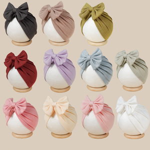 Nuevo lazo <span class=keywords><strong>para</strong></span> el pelo 2025, tejido jacquard fino, gorro <span class=keywords><strong>turbante</strong></span> de punto suave de color liso <span class=keywords><strong>con</strong></span> lazo <span class=keywords><strong>para</strong></span> bebés niñas - Product Image 1
