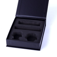 Boîte cadeau en forme de livre en papier noir avec logo en relief, insert en éponge, boîte en carton rigide personnalisée pour l'emballage de bijoux et de cosmétiques