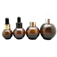 Flacons compte-gouttes en verre ambré uniques 10ml 20ml 30ml 50ml bouchons compte-gouttes en caoutchouc en forme de boule pour la sérigraphie d'huiles essentielles