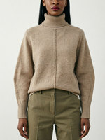 Pull col roulé élégant pour femme avec couture centrale, tricoté, doux, couleur avoine, coupe ample, minimaliste, pour l'hiver
