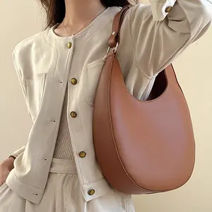 Fábrica venda quente 2024 novas tendências da moda mulheres bolsas de couro genuíno meia lua axila Bolsas de Ombro para senhoras