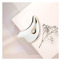 Heimgebrauch Hautpflege Anti-Cellulite-Maschine Anti-Falten-Massage gerät Elektrisches Gua Sha Gesichts vibrator Delphin-Massage gerät