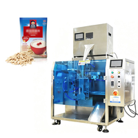 Machine d'emballage verticale haute vitesse pour granulés avec système de pesage pour l'emballage de sachets de snacks secs et de céréales