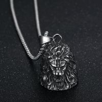 Collier Cloche Exorciste Porte-Bonheur en Acier Inoxydable Style Moto Punk Rétro Tête de Lion