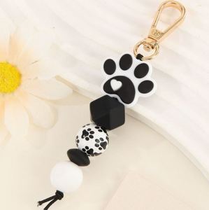 Silicone Cat Paw Beaded Keychain Fluffy <b>Pom</b>-<b>Pom</b> Wood Beads Handcrafted Light <b>Keyring</b> Accessory with Woven Technique - Product Image 3