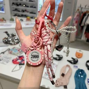 Llavero Decorativo Multiusos Estilo Niche con Cuerda Trenzada de Nylon Rosa y Material Acrílico - Product Image 3