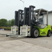 Chariot élévateur à fourche SNSC de 3,5 tonnes avec pince à blocs robuste et accessoire hydraulique pour la manutention de briques de ciment et de pierres