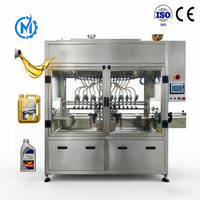 Machine de remplissage automatique 400BPH pour liquides (huiles, lubrifiants, huiles comestibles) en bidons et jerricans, avec suivi de poids et fonction de suivi des produits