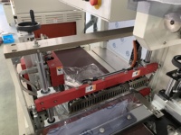 Système de scellage latéral entièrement automatique à moteur électrique pour film thermorétractable pour l'alimentation et l'habillement |   Emballage en film plastique de longueur infinie