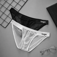 Micro string sexy pour hommes, sous-vêtement à fines bretelles, ajouré, avec poche de maintien, taille basse, lingerie exotique pour hommes gays, T-back masculin