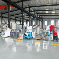 Machine à fabriquer des aliments pour poissons flottants 500 kg/h et extrudeuse à soufflerie pour aliments pour chiens multifonctionnelle 380V/415V
