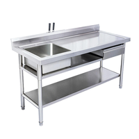 Commerciële roestvrijstalen voorbereidingswerktafel met afvoergat, spoelbak, keukenwerkbank voor restaurant, vlees en vis.