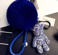 Offre Spéciale Mode De Luxe En Cuir Tressé Brin Plein Cristal Ours Pendentif Porte-clés Moelleux Pompon Porte-clés