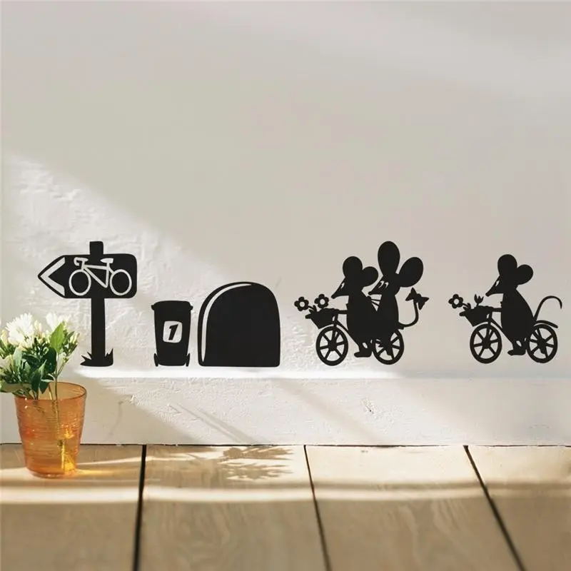 Black fine carved cartoon mouse riding a bicycle wall attached to the living room wall decoration stickers