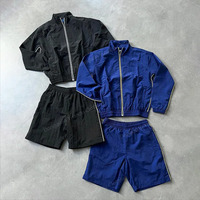 Ensemble de survêtement short en nylon pour hommes brodé sur mesure Ensemble de survêtement pour hommes résistant à l'eau, respirant, coupe-vent avec fermeture éclair