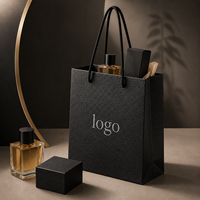 Sac cadeau en papier texturé noir de luxe personnalisé avec poignées en corde pour bijoux, parfums, chaussures et emballages de vente au détail pour boutiques