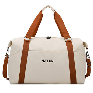 Vente directe d'usine : Sac de voyage et de sport grande capacité en tissu, tendance, créatif, simple et personnalisable - Product Image 1