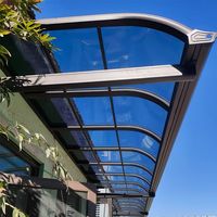 Design moderne Meilleur prix Toit plat décoratif isolant en verre Maison de jardin Toit d'auvent en PC pour le marché américain